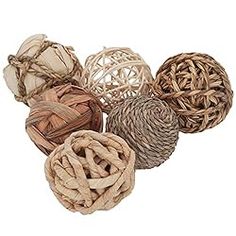 woven balls are arranged together on a white background