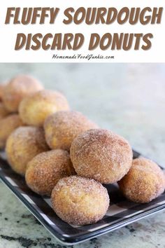 fluffy sourdough discard doughnuts on a plate with text overlay