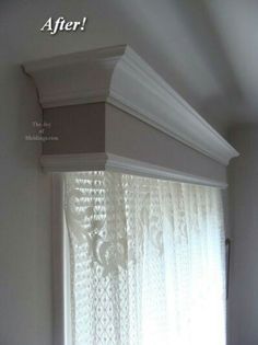 an image of a window with white curtains