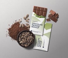 chocolate package and cocoa bar on grey background