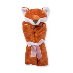 a small stuffed animal wrapped in a towel