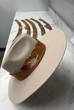 "* Genuine leather, handmade hat band * Hat not included * 25.5\" concho clasps 24.75\" & 25.25\"" Cheap Western Hat Bands For Outdoor, Feathered Cowboy Hat Band, Leather Scraps Ideas, Leather Hat Bands, Feather Hat Band, Burned Hats, Diy Leather Working, Hat Burning, Cowboy Hat Bands