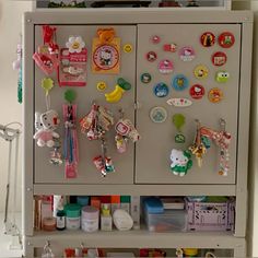 a refrigerator with lots of magnets on it