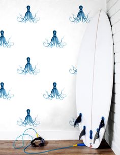 there is a surfboard with an octopus on it