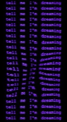 the word dream written in purple light on a black background with white letters and words