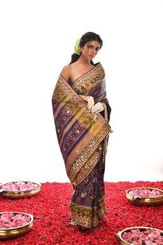 Indulge in the delicate beauty of this Authentic Pure silk Patan Patola Gota Patti Saree. Hand-embroidered in eye-catching Purple, it perfectly captures heritage elegance with a modern flair. Luxuriously soft and radiant, it is sure to make a statement at any event. Traditional Pre-draped Tussar Silk Saree With Intricate Embroidery, Elegant Art Silk Pre-draped Saree For Traditional Ceremonies, Elegant Traditional Wear With Multicolor Embroidery, Elegant Pre-draped Saree With Intricate Embroidery In Tussar Silk, Elegant Traditional Wear With Multicolor Zari Embroidery, Elegant Raw Silk Traditional Wear With Multicolor Embroidery, Gold Silk Saree With Intricate Embroidery, Elegant Traditional Wear With Multicolor Embroidery In Raw Silk, Elegant Traditional Wear With Multicolor Embroidery And Dupatta