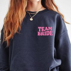 "Outfit your MAID OF HONOR in this retro, multi coloured MOH t shirt or crewneck sweatshirt! This shirt features a groovy, stacked graphic on the back with \"Team Bride\" on the front add in usual listing stuff Want the BRIDE to match? Get her decked out in her own BRIDE / FUTURE MRS t-shirt or crew neck sweatshirt! https://www.etsy.com/ca/listing/1450627622/future-mrs-bride-garment-dyed-tshirt?click_key=bdcccd6bc5779495ef9febac58f8243b6b2431d9%3A1450627622&click_sum=752e1fe1&ref=shop_home_active_2 The Bridesmaids should also have matching shirts! https://www.etsy.com/ca/listing/1464844285/bridesmaid-team-bride-garment-dyed?click_key=576768b281f2f0a58e0f34786553e2323df5ead0%3A1464844285&click_sum=ad8b9c06&ref=shop_home_active_1 T SHIRT COLOURS - Garment Dyed Please see color chart for all Relaxed Fit Crew Neck Top For Bachelorette Party, Customizable Crew Neck Tops For Bachelorette Party, Black Crew Neck T-shirt For Bachelorette Party, Pink Crew Neck T-shirt For Bachelorette Party, Black Crew Neck Top For Bachelorette Party, Bachelorette Matching Shirts, Cotton Outfit, Bachelorette Shirts, Team Bride