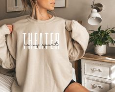 Theater Sweatshirt, Theater is My Sport Sweatshirt, Broadway Sweatshirt, Drama Shirt, Musical Theatre Gift, Actress Sweater, Actor Sweater * 50% cotton, 50% polyester * Medium-heavy fabric (8.0 oz/yd² (271.25 g/m * Loose fit * Sewn-in label * Runs true to size How To Order: 1. Choose a Sweatshirt size. 2. Pick a t-shirt color that you like. 3. From the drop-down menu, choose a quantity. 4. Add the item(s) to your shopping cart. 5. Select a mode of payment. 6. Make your purchase. Sizing: * S to 3 Hoodie Sleeve Design, Theater Mom, Musical Theater Gifts, Mom Pride, Gymnastics Mom, Theatre Gifts, Volleyball Mom, Mom Hoodies, Musical Theater