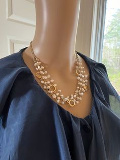 Excellent condition. Max. length: 21.5in.; min. length: 18.5in. Elegant Beaded Metal Layered Necklace, Elegant Double Strand Beaded Necklace With Chain, Elegant Multi-strand Beaded Chain Necklace, Costume Jewelry Multi-strand Layered Necklace, Formal Multi-strand Costume Jewelry Necklaces, Elegant Layered Multi-strand Chain Necklace, Elegant Multi-strand Layered Chain Necklace, Chic Multi-strand Pearl Chain Necklace, Elegant Multi-strand Bib Necklace For Party