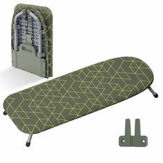 a green ironing board with yellow geometric designs