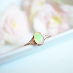 Hey, I found this really awesome Etsy listing at https://www.etsy.com/listing/570863192/rose-gold-opal-engagement-ring-vintage Art Nouveau Diamond Wedding Jewelry, Elegant Green Opal Ring For Formal Occasions, Art Deco Oval Opal Ring For Anniversary, Elegant Round Emerald Ring For Marriage, Art Nouveau Gemstone Jewelry For Wedding, Opal Wedding Ring With Intricate Design, Luxury Opal Wedding Ring With Accent Stones, Luxury Opal Ring With Accent Stones For Wedding, Elegant Opal Ring With Diamond Accents For Wedding