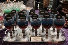 there are many wine glasses with names on them