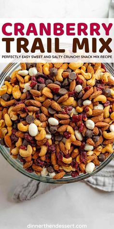 cranberry trail mix in a glass bowl with the title text overlay reads, cranberry trail mix perfectly easy and healthy snacky snack mix recipe