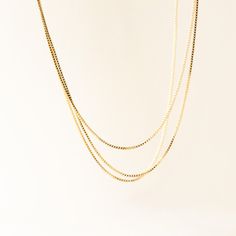 Introducing our 1mm Gold Filled Whitney Box Chain, a sleek and versatile piece. This delicate chain features a series of dainty small square links that offer a look, perfect for layering or wearing solo. • Single Chain Necklace• Gold Filled• Length Options: 18" + 1" extender OR 20" • Chain Width: 1mm Dainty Rectangular Chain Necklace, Dainty Box Chain Necklace With Rectangular Pendant, Dainty Square Pendant Chain Necklace With Delicate Chain, Dainty Chain Necklace With Square Pendant, Dainty Square Pendant Chain Necklace, Layering Jewelry, Body Sweat, Chain Necklace Gold, Box Necklace