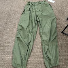 Cargo Pants Army Green Full Length Khaki Parachute Pants For Spring, Spring Utility Pants With Elastic Waistband, Spring Utility Full Length Parachute Pants, Spring Utility Pants Full Length, Utility Full-length Pants For Spring, Spring Utility Full-length Pants, Spring Utility Full Length Pants, Khaki Parachute Pants For Spring, Khaki Parachute Trousers For Spring