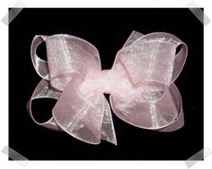 "This is my medium size double layer organza bow, which is made using 7/8\" width organza ribbon. It measures 4 inches across and will come attached to your choice of french clip barrette, alligator clip with the no-slip grip, or alligator clip with teeth. Please see the clip chart in photos for reference. All my bows are handmade by me using top quality ribbon here in my smoke-free home. I always heat seal every end to ensure long lasting, beautiful wear. Be sure and browse my entire store for Organza Bow, Clip Chart, French Clip, Thank You Photos, Organza Ribbon, Barrette Clip, Hair Bow, Alligator, Double Layer