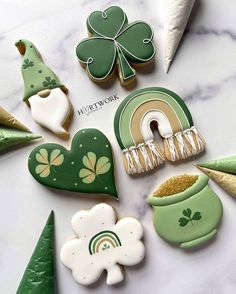 st patrick's day cookies are arranged on a table