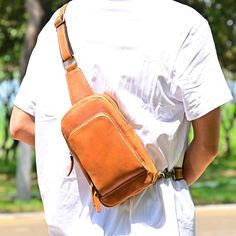 Men's Leather One shoulder bag Crossbody Bag Backpack for men Leather Shoulder Bag Messenger Bag For Men ◾PRODUCT INFORMATION --------------------------------------------- --Product Size:  - 26×16×5 cm  - 10.23×6.29×1.96 in --Item Weight: 0.6 kg/1.32Pounds --High-Quality & Density Stitching On the back of the crossbody bag are two hooks for both the left and right shoulders --FEATURES-- This leather messenger bag exudes an irresistible charm with its unique design and exceptional craftsmanship. Carefully constructed by skilled artisans, this bag embodies the perfect blend of functionality, durability, and minimaliste style. The bag is expertly fashioned from the first-layer cowhide, chosen for its natural beauty and remarkable resilience. Its rich hues and subtle variations in the leather' Casual Portable Shoulder Bag For Everyday Carry, Casual Everyday Chest Bag With Mobile Phone Holder, Outdoor Chest Bag With Adjustable Strap, Outdoor Satchel Chest Bag With Cell Phone Pocket, Brown Chest Bag With Cell Phone Pocket For Outdoor, Everyday Carry Chest Bag With Anti-theft Pocket, Rectangular Chest Bag For Outdoor Activities, Riding Bag, Messenger Bag For Men