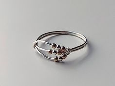 Metal Rings Diy, Ring Wire, Worry Ring, Wire Wrapped Ring, Fidget Rings, Silver Spinner Rings, Diy Rings, Spinner Ring, Wire Wrapped Rings