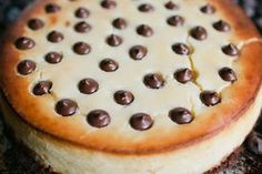 a cheesecake with chocolate chips on top