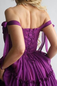 Orders ship out approx 1-3 days after purchase. Transit times approx 3-5 days for US destinations. Our signature Siena is THE main character dress. Siena features a three tier dress in the perfect shade of dark jewel-tone purple.The bust features V shaped corset boning that gives a flattering look. The Siena features a functional corset back closure that you can tighten for a snatched bodice look, adjusting the bust and the waist, helping you get the perfect fit every time. The scooped neckline Purple Ruffled Ball Gown Dress, Purple Ball Gown Dresses With Ruffles, Purple Ruffled Ball Gown, Purple Evening Dress With Ruffled Fitted Bodice, Purple Gown With Pleated Fitted Bodice, Purple Sleeveless Ruffled Gown, Purple Gown With Pleated Bodice, Elegant Purple Dress With Corset Back, Fitted Purple Gown With Pleated Bodice