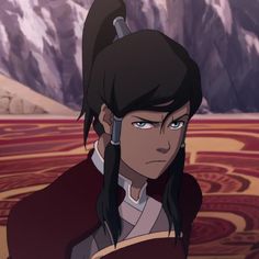 an animated avatar with long black hair and blue eyes, standing in front of snow covered mountains