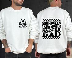 Somebody's Loud Mouth Soccer Dad Sweatshirt, Soccer Daddy Sweater, Fathers Day Shirt, Cheer Dad Hoodie, Soccer Dad Gift, Game Day Soccer Welcome to VickyTeeDesign Shop! How to Order  * Please choose your t-shirt color and the shirt size by the drop-down menus * Enter the design idea or the personalization if you would like. * Please feel free to ask any questions. My Shirt Material Is Below:   Solid colors: %100 Cotton. (White and Black) Heather colors: %52 Cotton + %48 Polyester. Please Consider the Care Instructions Below:  * Cold Wash * Turn inside out * Do Not use bleach * Wash with like colors * Tumble Dry Low or Hang Dry * Medium Iron * Do not iron the decoration * Do not dry clean. Please contact me if you have any problems with your product. Thanks for your shopping. Soccer Brother Shirt Ideas, Funny Soccer Mom Shirts, Soccer Fan Shirts, Soccer Dad Shirt, Sporty Crew Neck T-shirt For Father's Day, Sports Mom Shirts, My Shirt, Soccer Shirts, Fathers Day Shirts