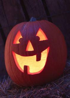 a pumpkin carved to look like a jack o lantern