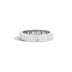 JOON Carre Eternity Ring 14K White Gold Timeless Sterling Silver Channel Set Rings, Modern Stackable Eternity Band In White Gold, Luxury Channel Set Eternity Band For Anniversary, Timeless White Gold Stackable Rings With Emerald Cut, Modern Eternity Band With Single Cut Diamonds For Anniversary, Modern Stackable Eternity Band For Anniversary, Timeless Channel Set Eternity Band, Timeless Platinum Eternity Band For Anniversary, Timeless Emerald Cut Eternity Band Gift