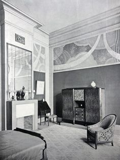 an old black and white photo of a bedroom with a painting on the wall above the fireplace