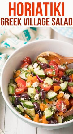 this greek salad is loaded with fresh vegetables, feta cheese and lots of olives