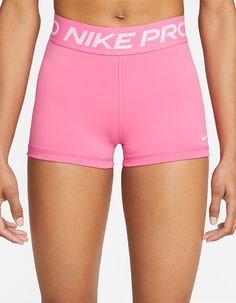 Woman in bubblegum pink compression shorts with Dri-FIT sweat-wicking technology and logo at elastic waistband. Pink Nike Pros, Cute Nike Outfits, Pink Activewear, Nike Pro Women, Nike Pro Shorts, Cute Preppy Outfits, Cute Nikes, Shorts Nike, Cute Comfy Outfits