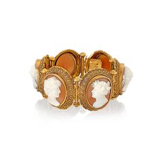 19th Century Cameo bracelet. Consisting of six individual oval sections, graduating in size, the largest being in the centre. DETAILS Each section contains a Shell Cameo with a 3D female head surrounded by Etruscan style applied bead and twisted wire work. The sections are joined by a bar, hinged in the centre. French import marks. 18ct yellow gold. Weight of bracelet 56.2 grams Luxury Cabochon Bracelets For Wedding, Luxury Wedding Bracelet With Cabochon, Antique Gold Bracelet For Formal Occasions, Antique Gold Bracelet For Gift, Oval Cabochon Bracelets For Formal Occasions, Heirloom Oval Bracelets For Formal Occasions, Elegant Formal Cabochon Bracelets, Formal Intaglio Bangle Jewelry, Victorian Hallmarked Bracelets