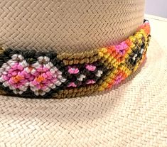 Add a burst of color to your hats with this handwoven hat band. Perfect on cowboy hats, panama hats or summer straw hats. Each one is woven in macrame and comes in a variety of colors. Will also be a perfect belt or add as a strap to your favorite purse or bag. Length: 23 inches, not including fringe Width: 1 inch Summer Straw Hats, Macrame Strap, Mexican Hat, Summer Straw Hat, Favorite Purse, Straw Hats, Woven Belt, Hat Band, Straw Hat