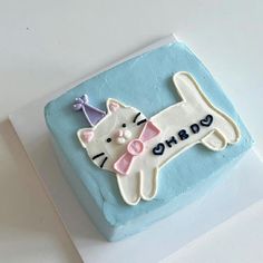 a birthday cake with a cat on it