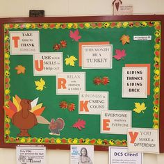 a bulletin board with thanksgiving words and pictures on it