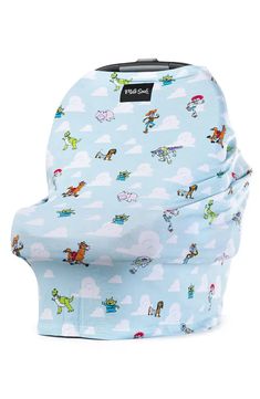 a blue baby seat cover with cartoon characters on the front and back, sitting against a white background