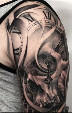 a man's half sleeve with a clock and skull tattoo on his arm,