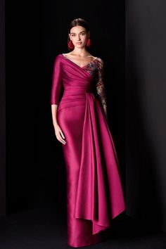 Magenta dress featuring an asymmetric neckline, one full-length embroidered sleeve, a plain three-quarter sleeve, gathering across the bodice, a draped skirt panel, and a floor-length silhouette. Long Dress Fitted, Mikado Dress, Marchesa Couture, Yellow Wedding Dress, Magenta Dress, Midi Dress Style, Fashion Journals, Asymmetric Neckline, Draped Skirt