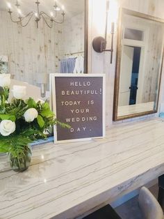 there is a sign that says hello beautiful today is your wedding day on the counter