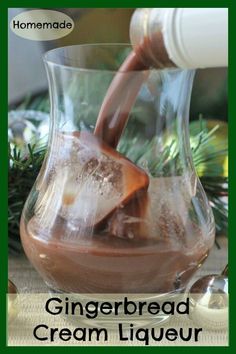 a glass pitcher filled with ice cream and chocolate syrup being poured into the jar for gingerbread creme liqueur