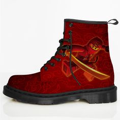 a pair of red boots with an image of the lego movie character on them and black rubber soles