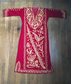 "1970s handmade kaftan shirt dress red velvet gold color brocade w/silver accenting thread deep v pullover 3/4 sleeve ankle length, depending on wearer's height 7\" side slits good vintage condition, light wear no size tag, one size fits most, see below measures, lying flat, shoulder-17\" sleeve-17\" chest-21 1/2\" waist-19\" hip-23\" length-51\"" Festive Gold Thobe For Festivals, Fitted Long Sleeve Kaftan For Ceremonial Occasions, Fitted Long Sleeve Kaftan For Festivals, Red Bohemian Kaftan For Ceremonial Occasions, Red Bohemian Ceremonial Kaftan, Bohemian Gold Kaftan With Zari Work, Gold Bohemian Kaftan With Zari Work, Fitted Red Long Sleeve Kaftan, Long Sleeve Kaftan With Gold Embroidery For Festivals