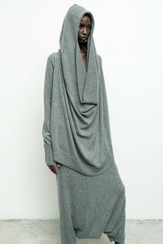 100% cashmere/ oversized hoody with draped cowl neck/ soft airy knit construction/ ribbed hood and hem/ thumbholes Jimai is 5'10" size 2 wearing size S Elastic Waistband Skirt, Hooded Cowl, Gauze Skirts, 2024 Style, Accessories Bags Shoes, Wrap Crop Tops, Convertible Dress, Knit Bottom, Sleeveless Crop Top