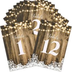 PRICES MAY VARY. Table Number Sign Set: we will provide you with 12 pieces of rustic table numbers, printed with numbers 1-12, which can meet the needs of most banquets, mark your table and make it convenient for guests to find their own position Reliable and Reusable: our wedding paper table numbers are made of quality 300 g coated paper, not easy to break or fade, which can be applied with various brackets as table decorations and table signs, and thick cardboard makes them reliable and reusab Wedding Seating Chart Table, Wood Lights, Wedding Table Seating Chart, Rustic Table Numbers, Centerpieces For Tables, Wedding Table Seating, Decoration Restaurant, Calligraphy Print, Reception Centerpieces