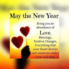 someone holding two hearts in their hand with the words, may the new year bring you an abundance of love