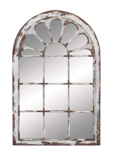 an old window frame mirror on a white background