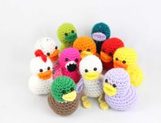 small crocheted stuffed animals are arranged together