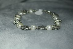 Very cool, abstract freshwater, pearl, and bead bracelet May 31, Bead Bracelet, Fresh Water, Freshwater Pearls, Jewelry Bracelets, Beaded Bracelets, Ships, Bracelet, Beads