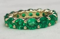 Gorgeous Eternity ring wedding or anniversary 14k yellow gold  ringSET 14 natural round green emerald weight 6.72ct carat total weight.  size 5mm natural  green emerald clean ,superb cut,very brilliant ,gorgeous green  color .Ring Size: 6.5Retail value $12,500 net .Appraisal availab Vintage Engagement Rings Round, Platinum Engagement Rings Vintage, Gold Ring Sets, Engagement Rings Round, Round Diamond Engagement Rings, Lovely Ring, Platinum Ring, Vintage Engagement, Yellow Gold Ring